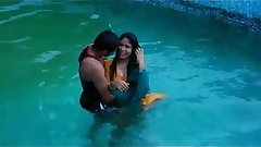 Lovers hot romance in swimming pool